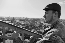 Danish Soldier enjoying the view from the top of Church of Our Saviour Copenhagen Denmark